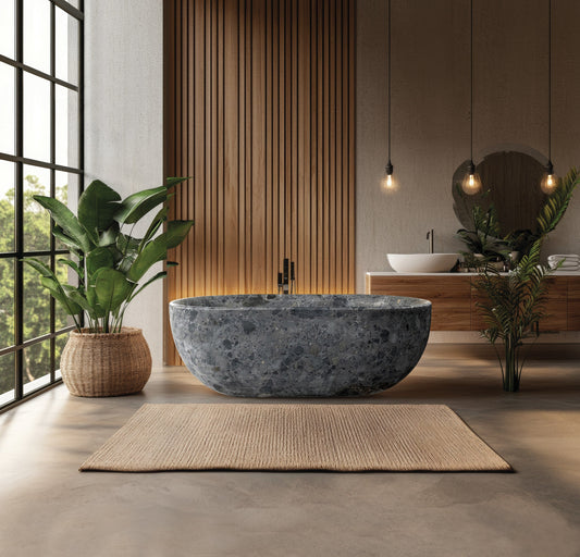 Conca natural stone basin in a bathroom setting