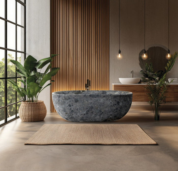 Conca natural stone basin in a bathroom setting