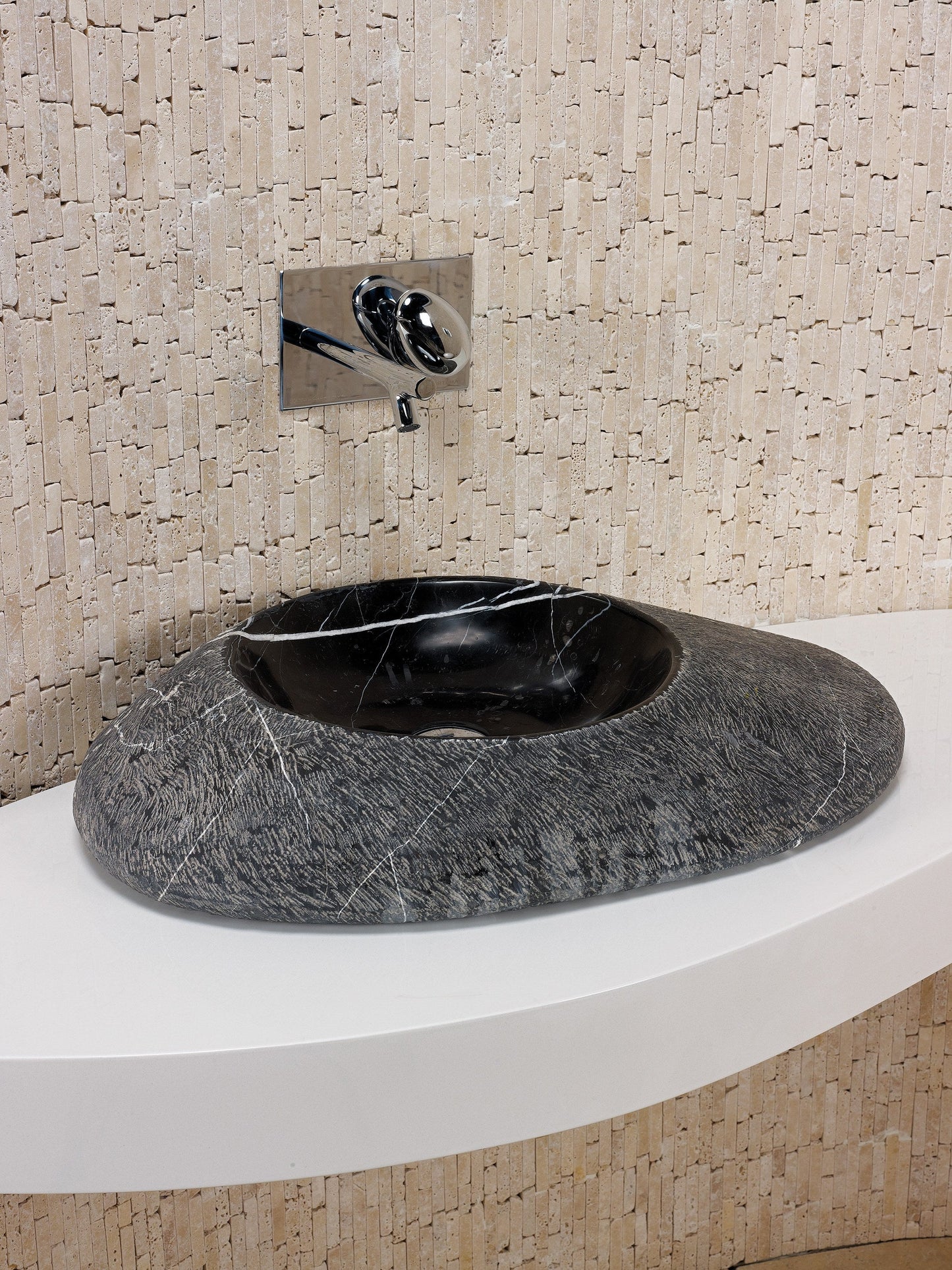 Portofino natural stone basin in a bathroom setting