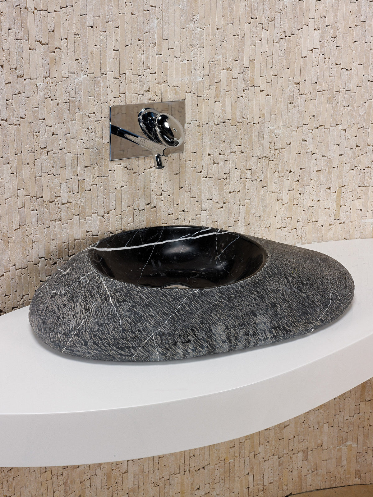 Portofino natural stone basin in a bathroom setting