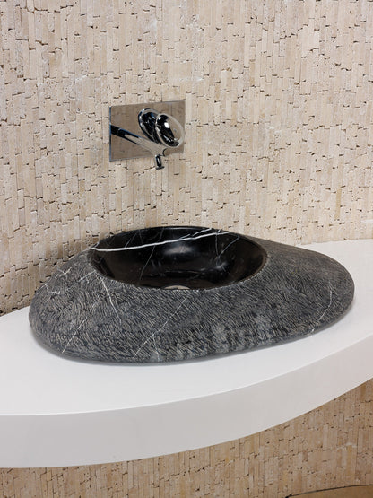 Portofino natural stone basin in a bathroom setting