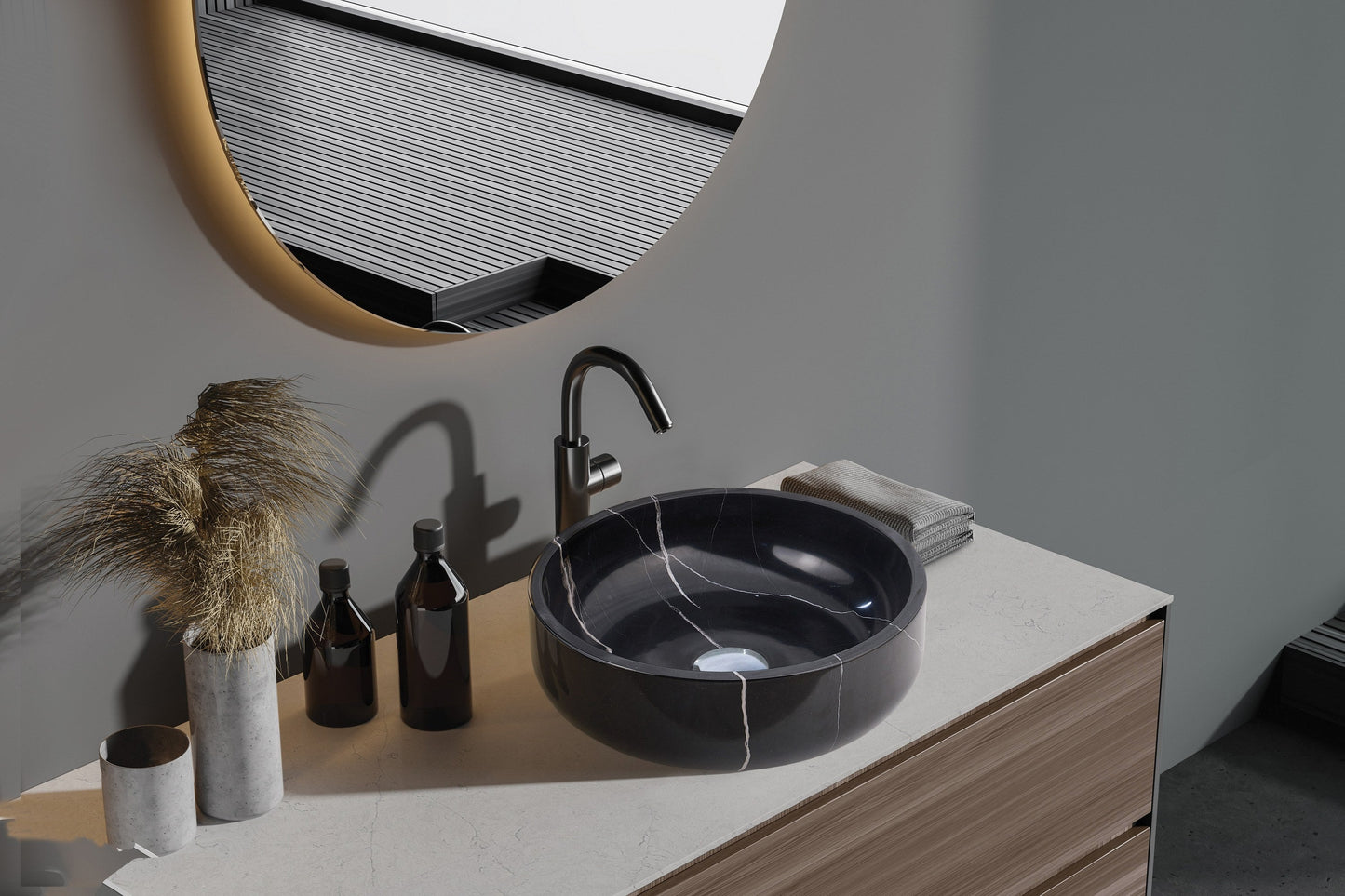 Novara natural stone basin in a bathroom setting