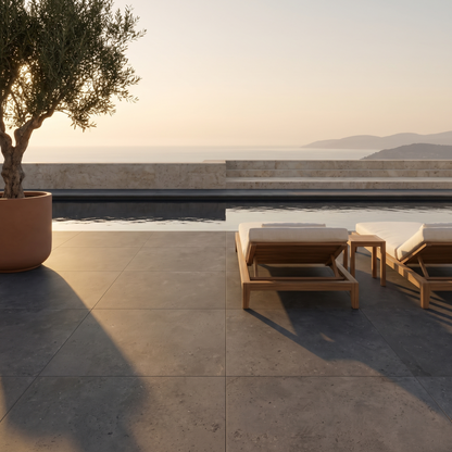 Genesis Anthracite porcelain paving on a clifftop pool terrace