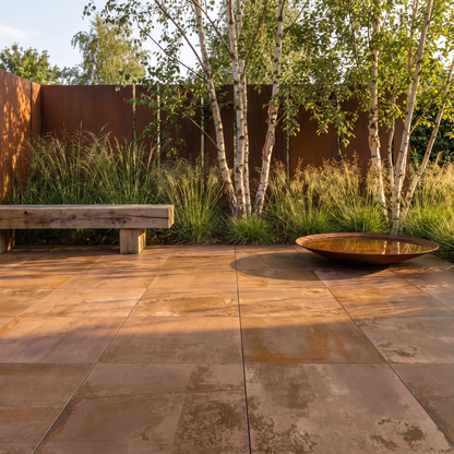 Metallic Corten porcelain paving on a contemporary garden terrace