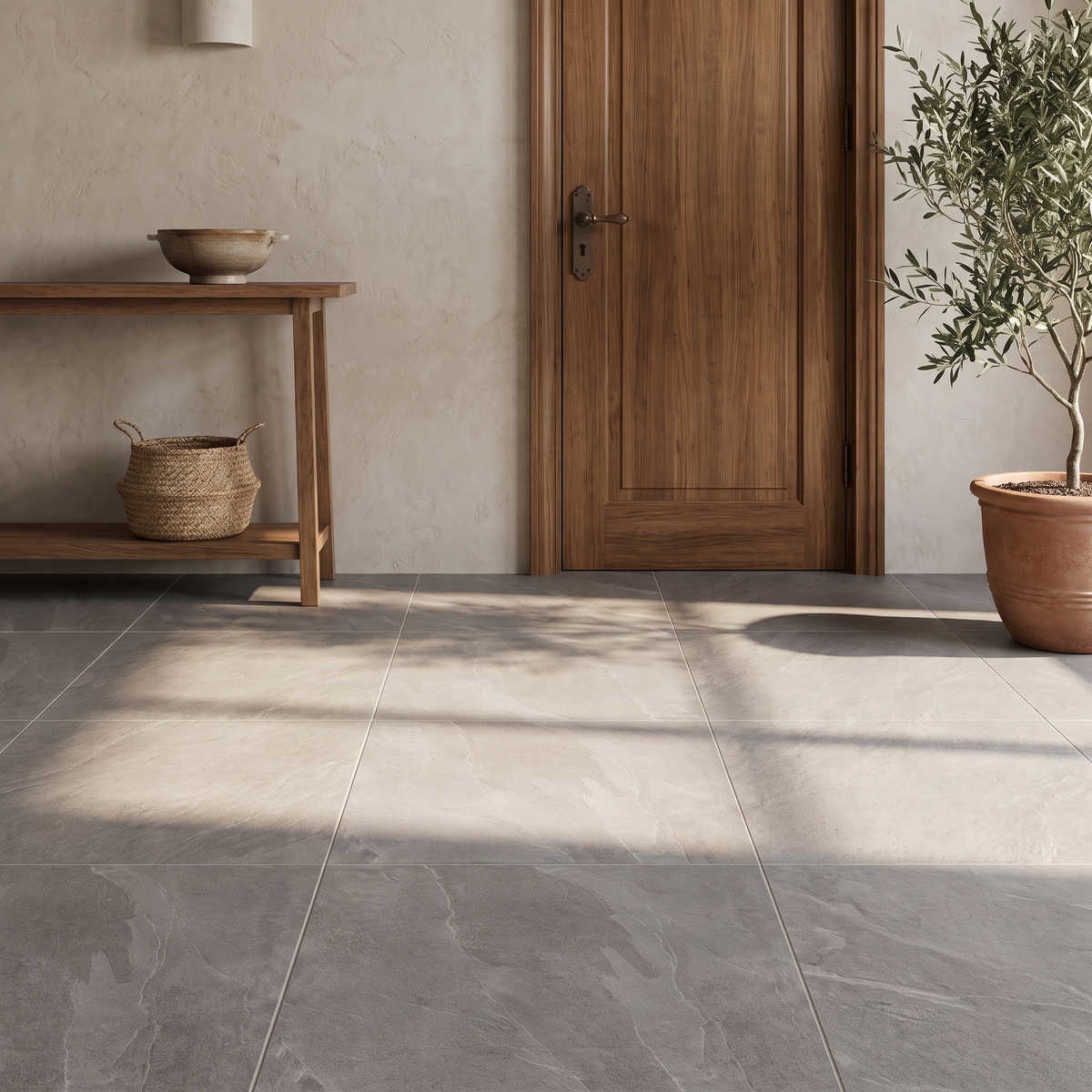 Torino Grege slate-look porcelain floor in a warm entrance hall