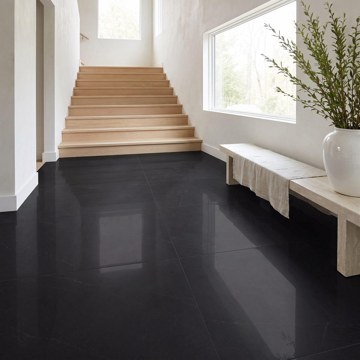 Super Black polished porcelain floor in a bright entrance hall
