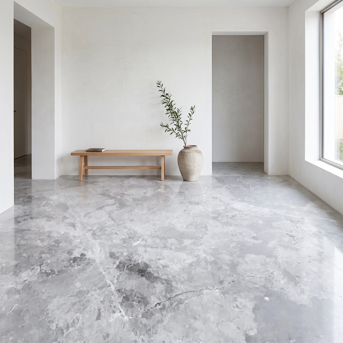 Arctic Grey marble floor in a bright minimal entrance hall