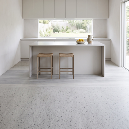 Colonial White stone floor in a bright minimal kitchen
