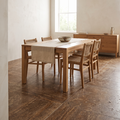 Noche travertine floor in a warm bright dining room