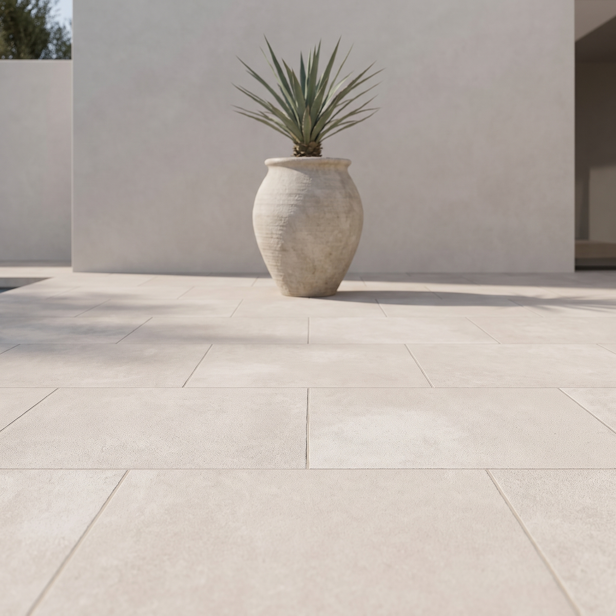 Cemento Ivory porcelain paving in an outdoor setting