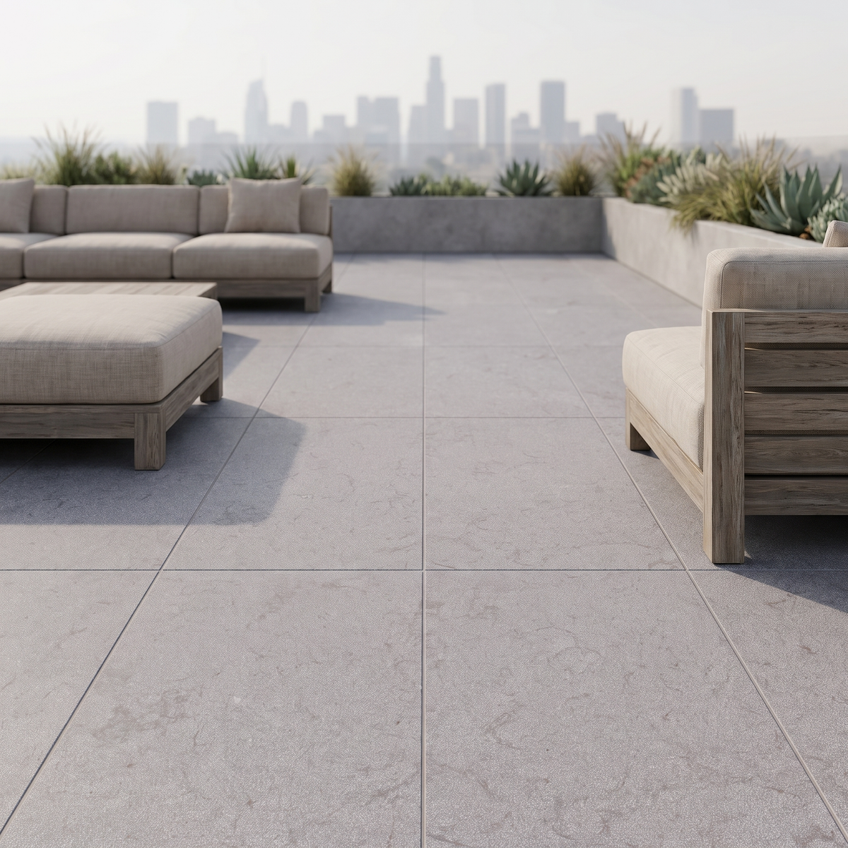 Manarola Sandblasted Taupe porcelain paving in an outdoor setting