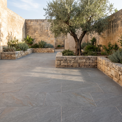 Neo Quarzite Grey porcelain paving in an outdoor setting