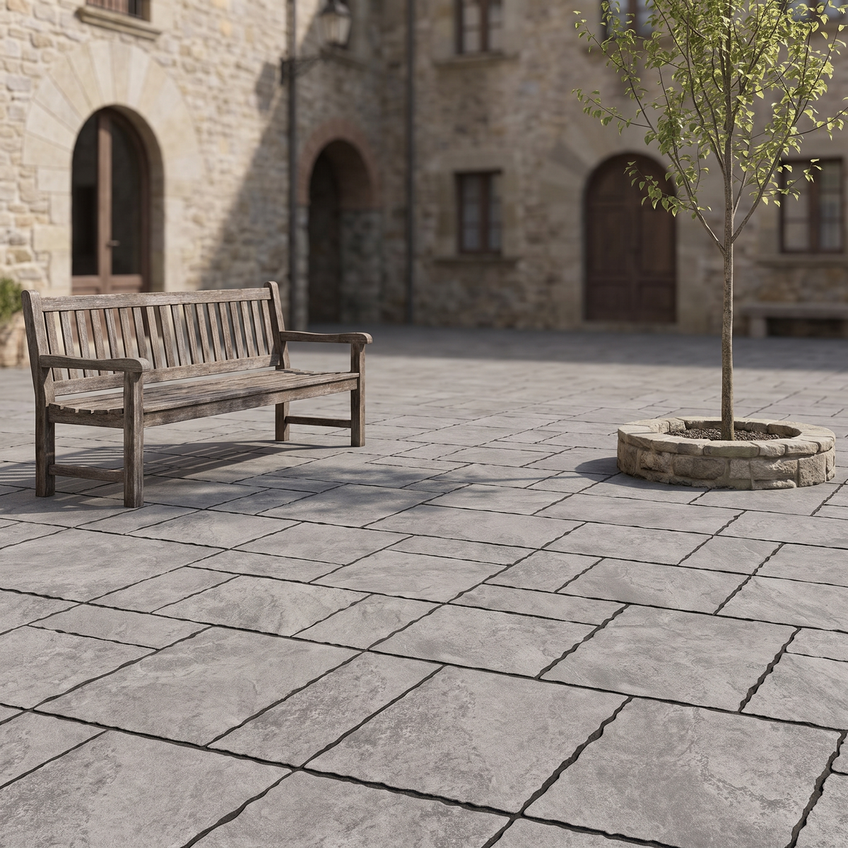 Cobble Modular Jupiter Grey porcelain paving in an outdoor setting
