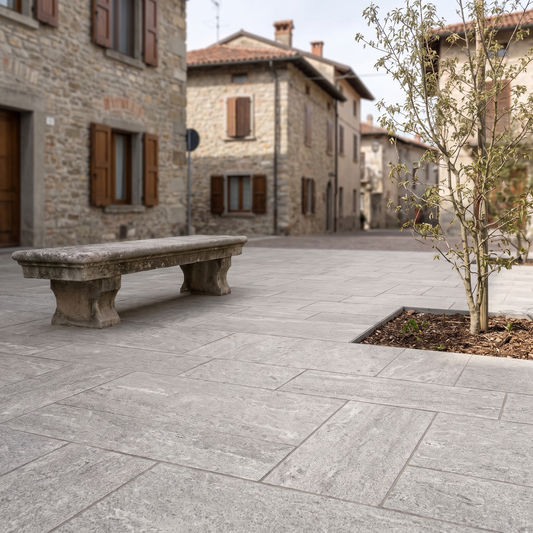 Cobble Modular Quartz Gray porcelain paving in an outdoor setting
