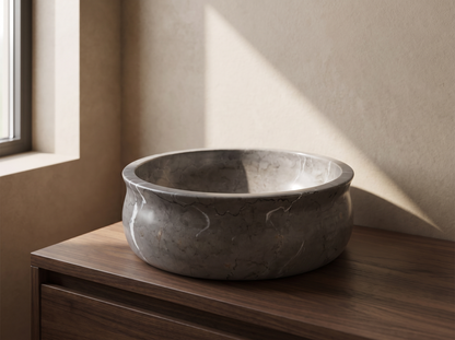Como natural stone washbasin in a bathroom setting
