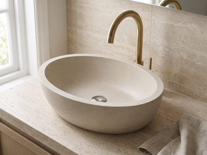 Genova natural stone washbasin in a bathroom setting