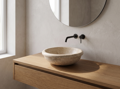 Lucca natural stone washbasin in a bathroom setting