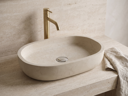 Rapallo natural stone washbasin in a bathroom setting