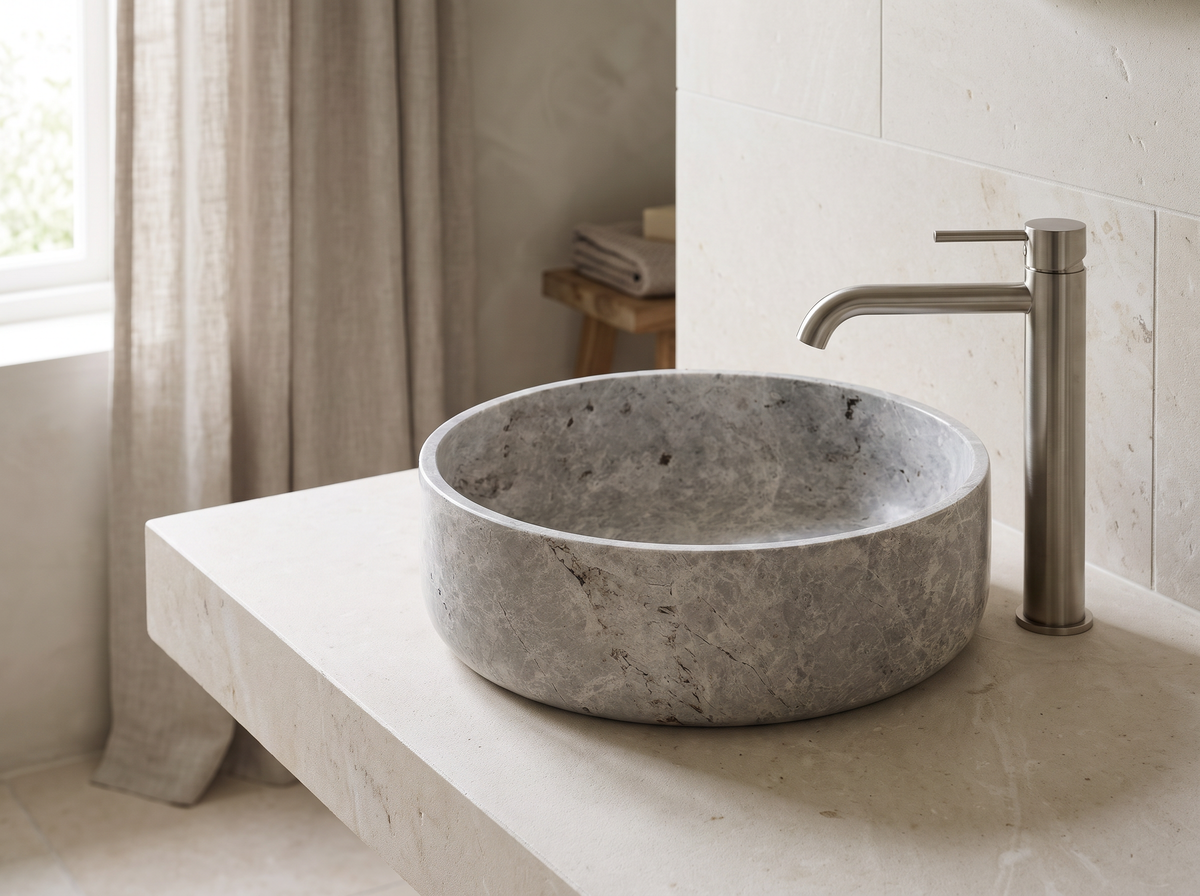 Novara natural stone basin in a bathroom setting